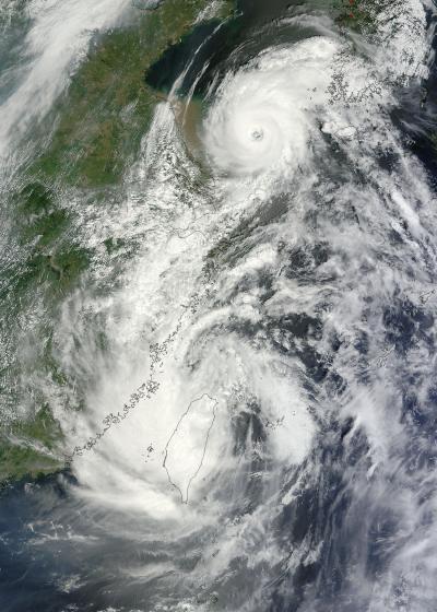 NASA satellites see Tropical Storm Saola and Typhoon Damrey arm-in-arm near China NASA satellites see Tropical Storm Saola and Typhoon Damrey arm-in-arm near China