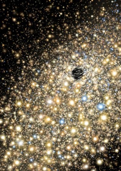 Record massive black holes discovered lurking in monster galaxies